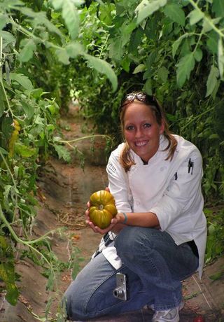 Penn_Chef_Val_in_High_Tunnel_with_Heirloom