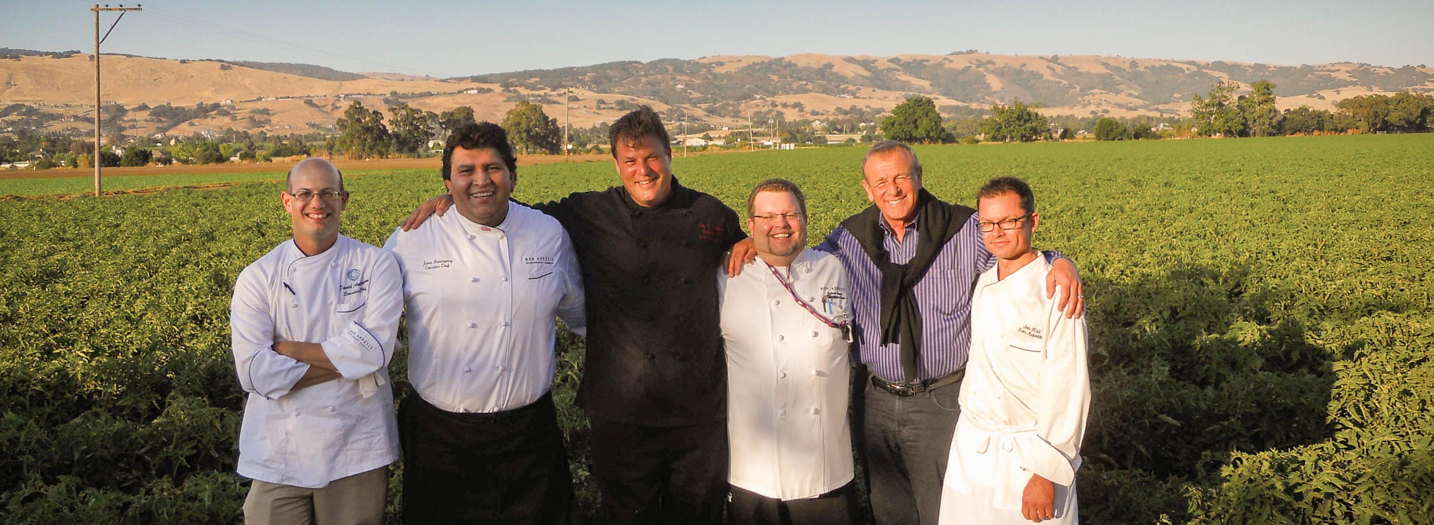 BAMCO chefs and CEO Fedele Bauccio in field