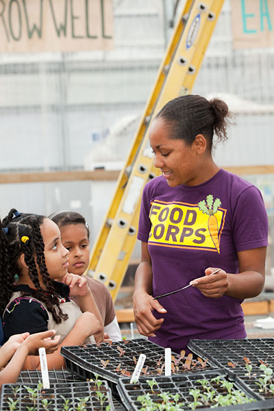 FoodCorps Service Member Stephanie Simmons with students at the Food Project in Roxbury, Massachusetts. Photo credit: Kelly Campbell