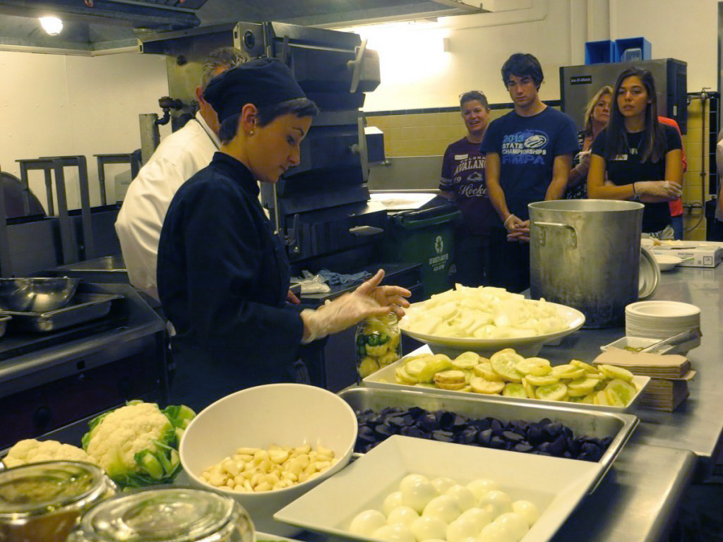 Sous Chef Jackie Lovecchio makes a sample batch of pickles.