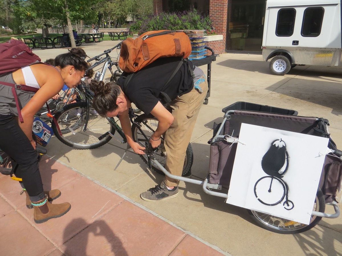 Colorado College students Lonnie and Shane hitch up the trailer to deliver recovered food from Colorado College's Rastall Café to Marion House Soup Kitchen.