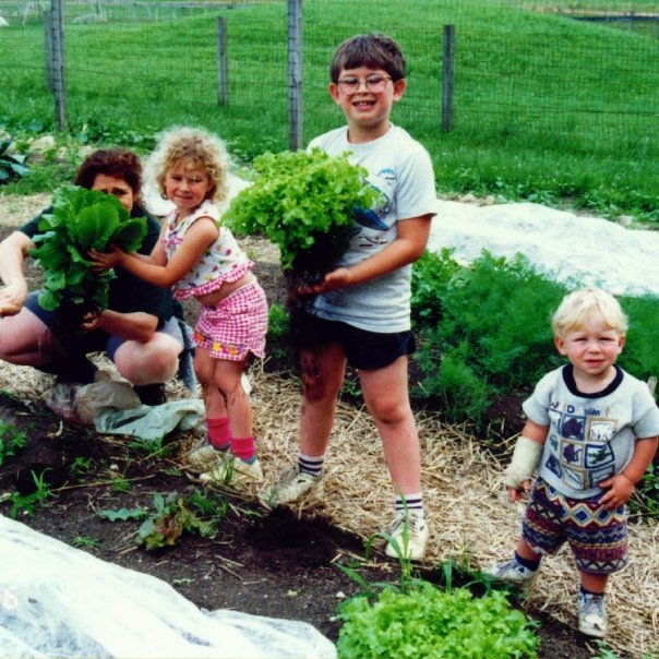 Me as a kid enjoying some garden-fresh greens