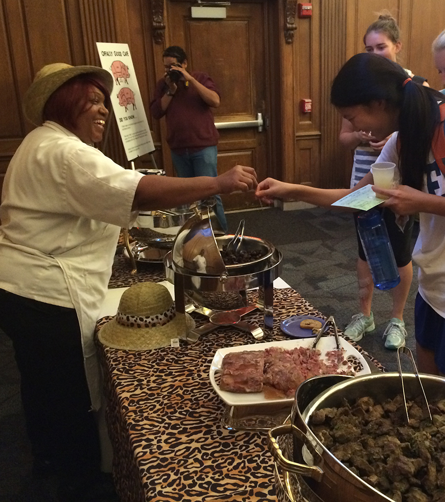 Duke Dining Lead Food Service Worker Brenda Young offers samplings of chitlins