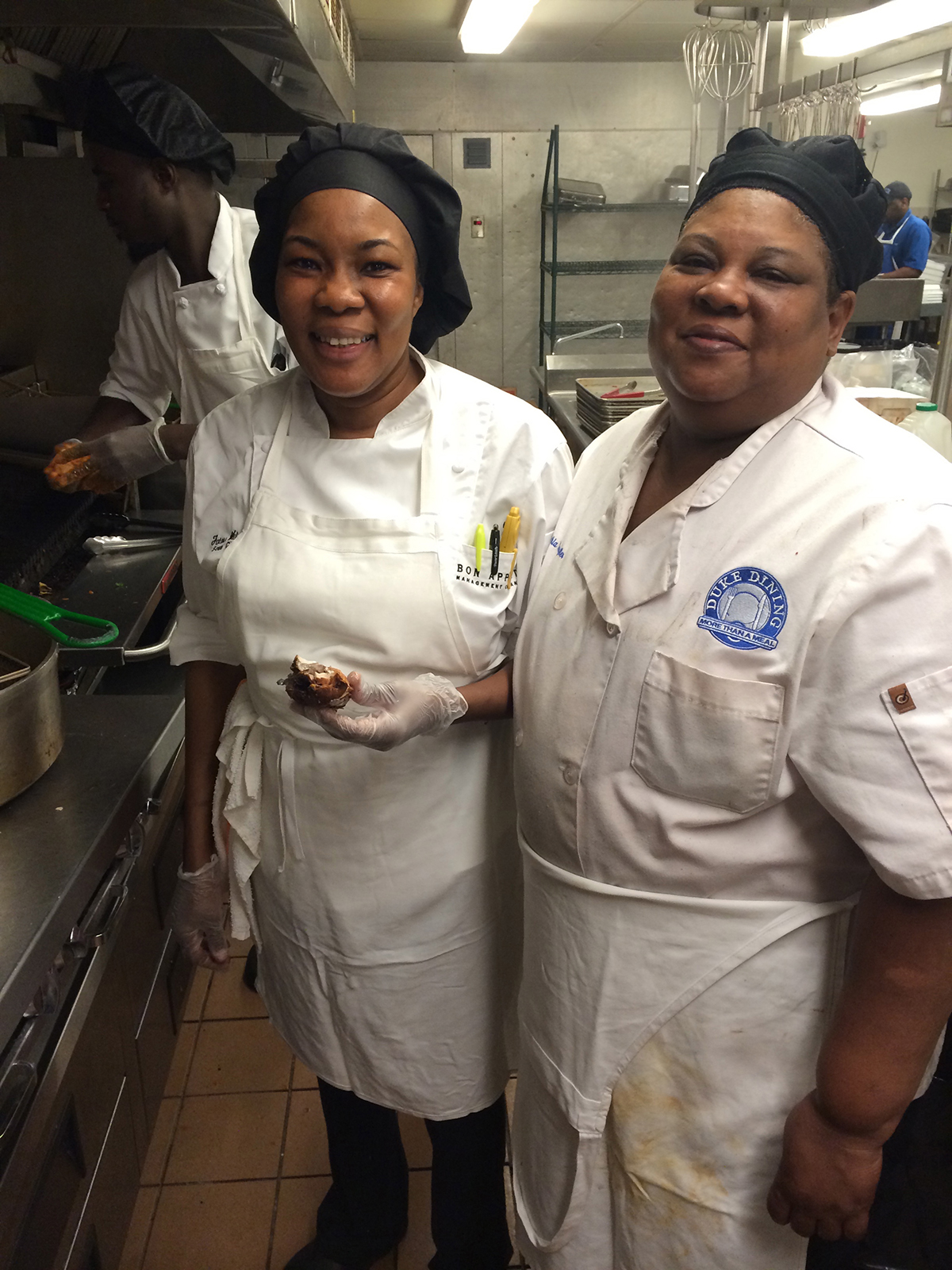 UPenn Sous Chef Fatou Wilson and Duke Dining Lead Production Worker Cynthia Dantzler prepare traditional Senegalese cuisine