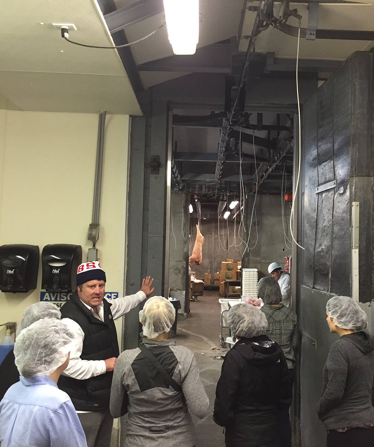 David Evans gives the Bon Appétiters a peek into the cutting room of the Marin Sun Farms slaughterhouse
