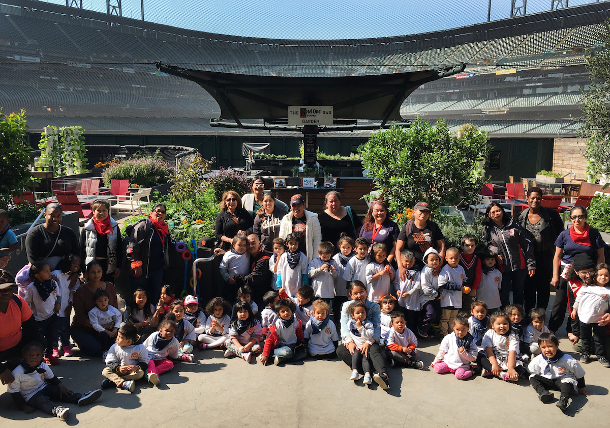 Field trip participants gathered together, posing for photo