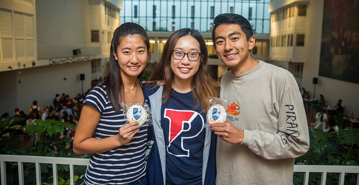 Penn students holding cookies