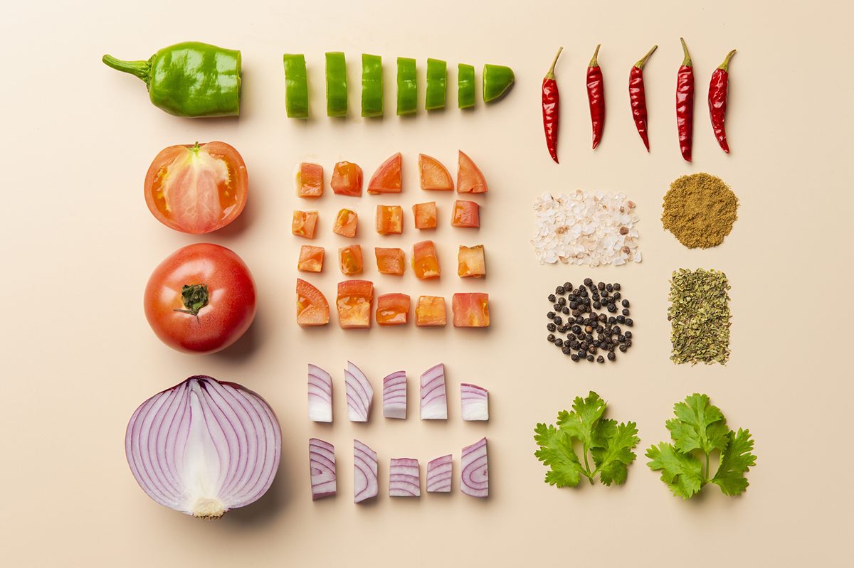 Chopped ingredients, including cilantro, onion, and chilies