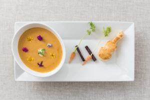 Squash soup with cello-shaped biscuit