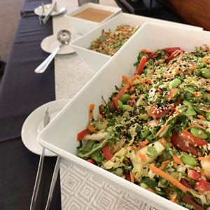 Executive Chef Chito Rodriquez’s sesame bok choy salad was among the items served at a catering showcase