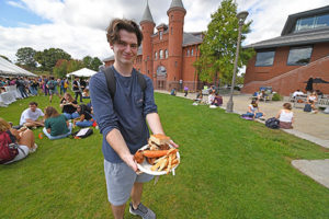 Student with his 100% local meal