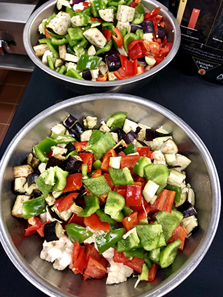 The colorful vegetable sauté included bell peppers, eggplant, cauliflower, and broccoli