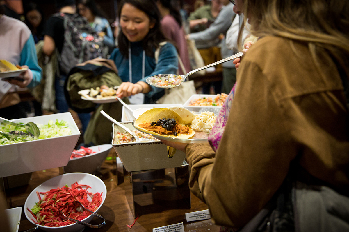 Students wait in the buffet line with their reusable plates