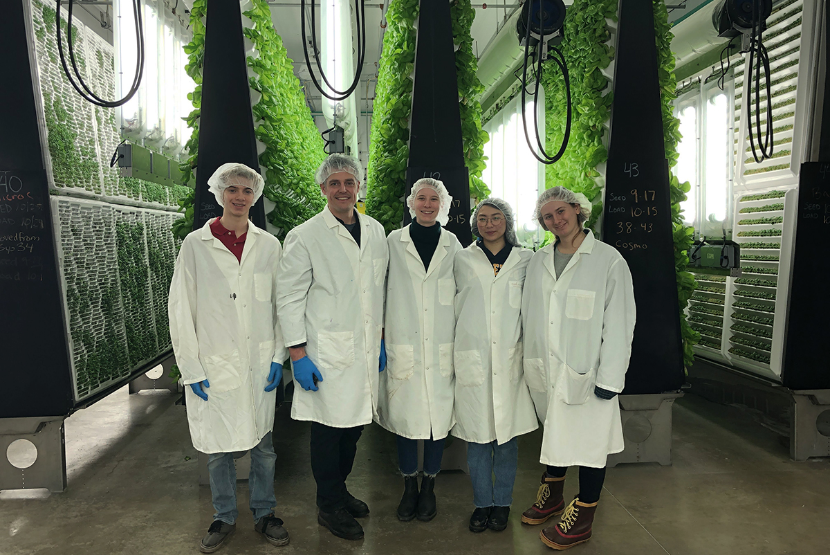 Carleton Executive Chef Charlie Schwandt (second from left) and Fellow Lily Gross (center) joined three Carleton students for the tour