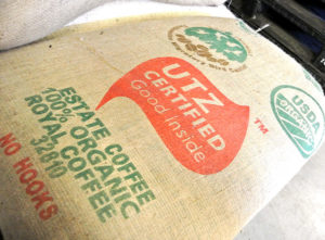 Coffee beans with certifications on bag