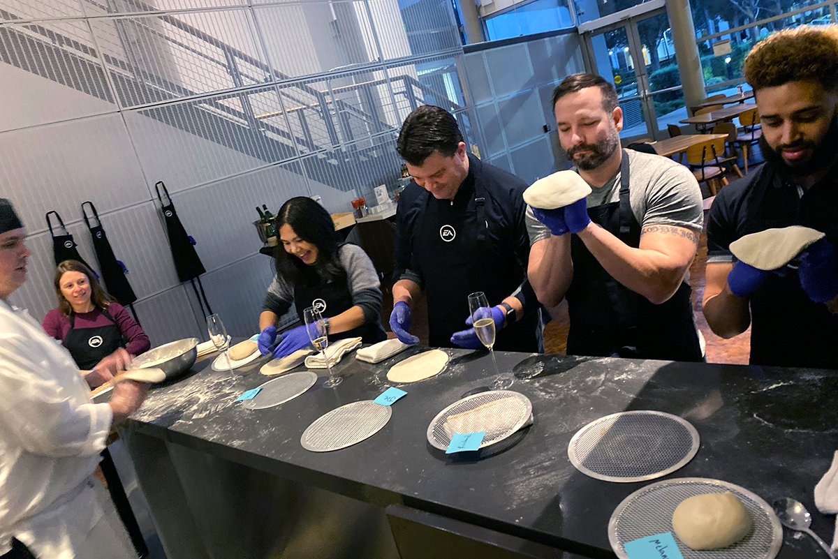 Stretching pizza dough is harder than it looks!