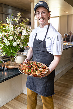 The Commissary Executive Chef Eric Minnich shows off his gambas al ajillo