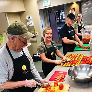 Washington University in St. Louis Campus Executive Chef Patrick McElroy (in black ballcap) with other World Central Kitchen volunteers in Fremont, NE