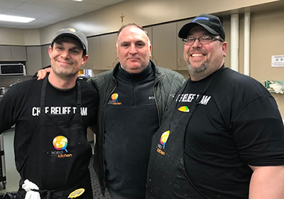 Cornell College General Manager James Richards (left) and Sous Chef Shane Olinger (right) with chef José Andrés, founder of World Central Kitchen