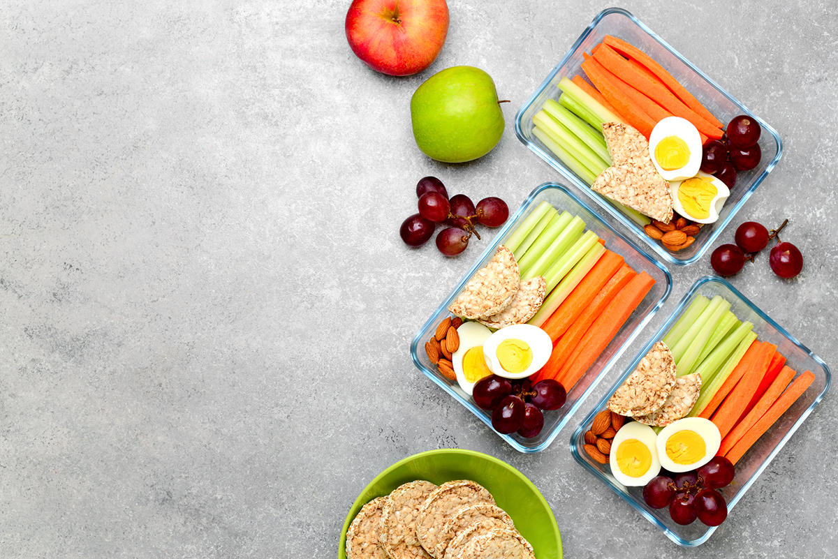 Lunch boxes with healthy snacks, healthy food concept, view from above, blank space for a text