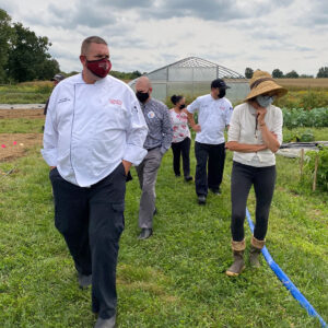 Chef and people on a farm