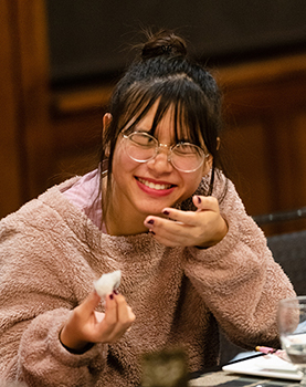 A student really enjoying her taste of sushi rice