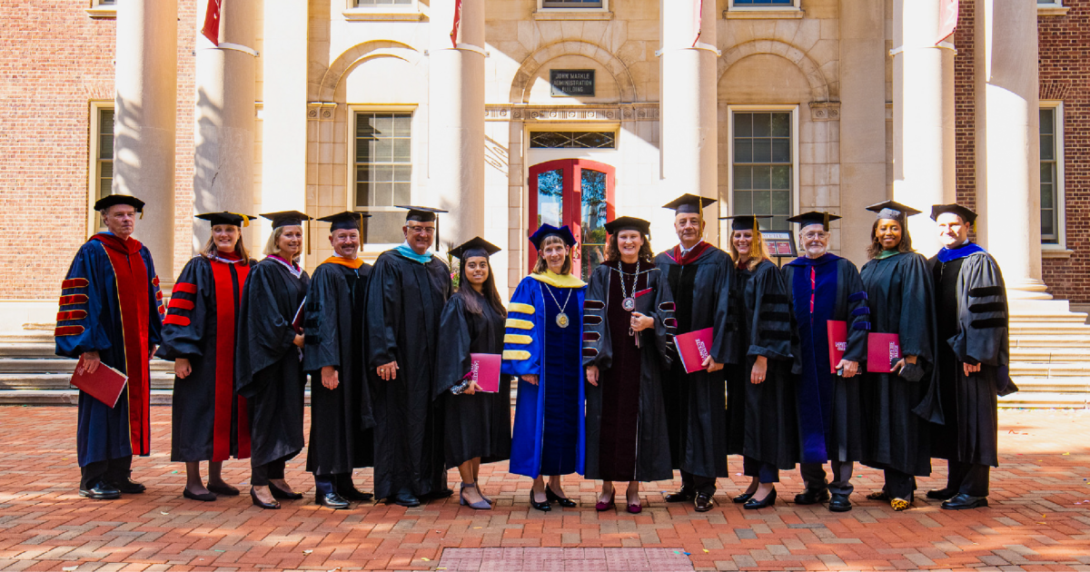 Dr. Byerly and Dr. Hurd pose with Lafayette College senior staff, Lafayette Student Government President Flor De Maria Caceres Godoy and Easton, PA Mayor Sal Panto in front of Lafayette’s Markle Hall 