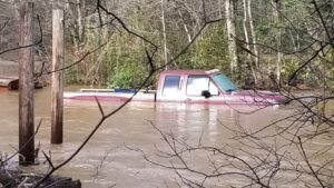 The flood wasters reached as high as the cabin of Bruce's truck.