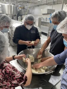 Executive Chef Francisco Ramirez and Executive Chef Marcos Rios make fresh mozzarella 