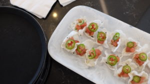 Canapés grace a table at a private Eat Local Challenge dinner held by a Bon Appétit team at a transportation technology company.