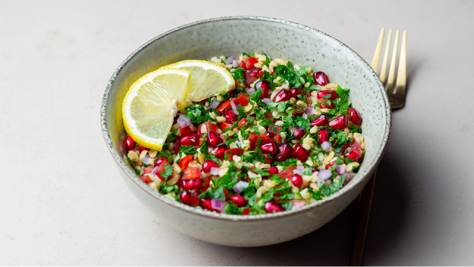An image of tabbouleh with a lemon slice