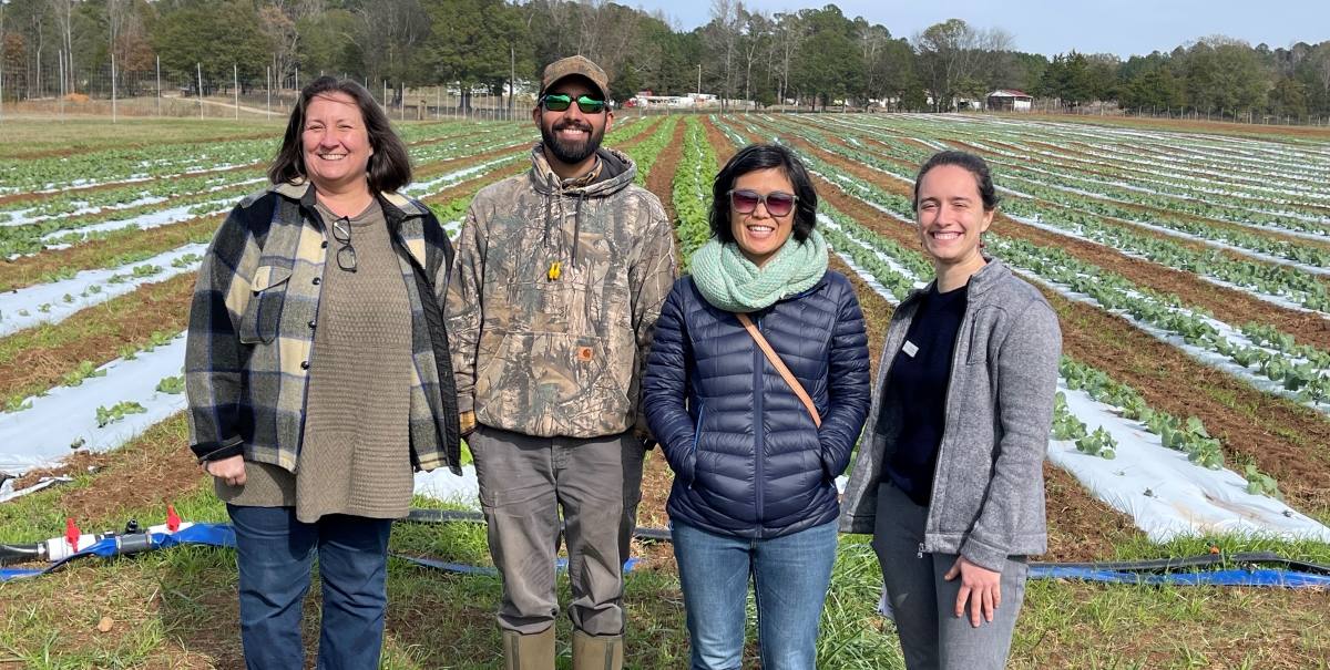 From left to right, Bon Appétit at Emory University Sustainability Manager Julie Mulisano, Snapfinger Farm Owner Rahul Anand, The Common Market Outreach Specialist Kameko Nichols, and Bon Appétit Midwest Fellow Elise Kulers on a recent visit to Snapfinger Farm, which wholesales to The Common Market.