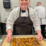 Saint Mary-of-the-Woods College Executive Sous Chef Hannah Newsom poses with portabella mushroom bacon