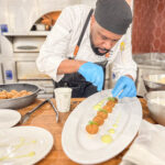 Oxford College at Emory University Executive Chef Demetrise Edwards carefully plants a dish during the training