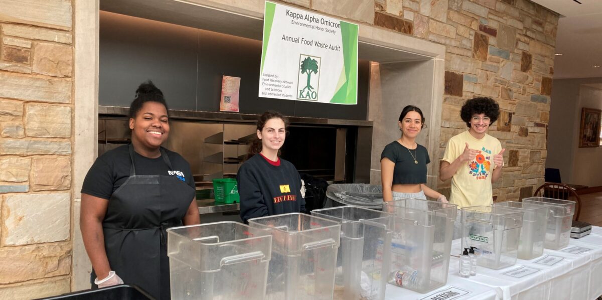 Rhodes College students pose during a weigh the waste event