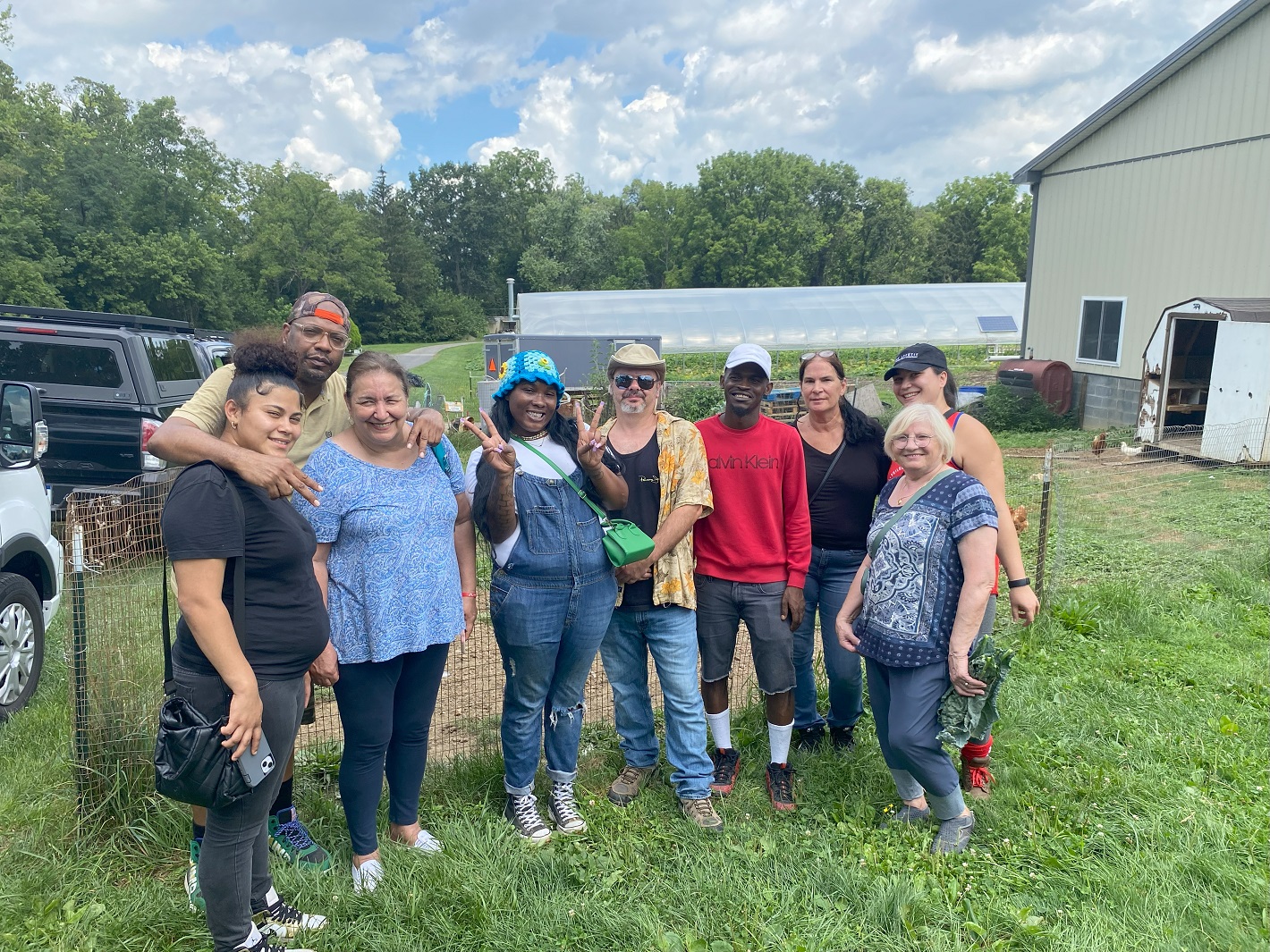 a group of co-workers on a farm tour.