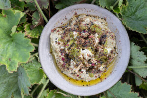 An overhead shot of a bowl of baba ghanoush. 