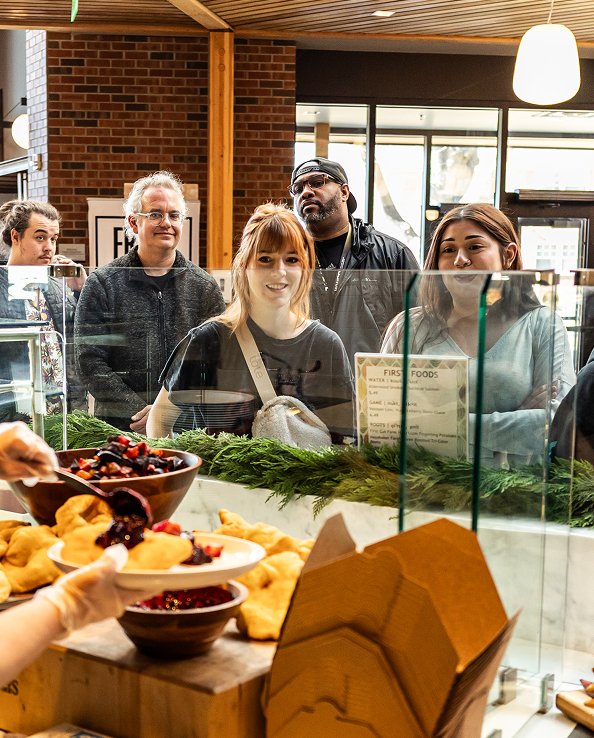 student serving parent at college