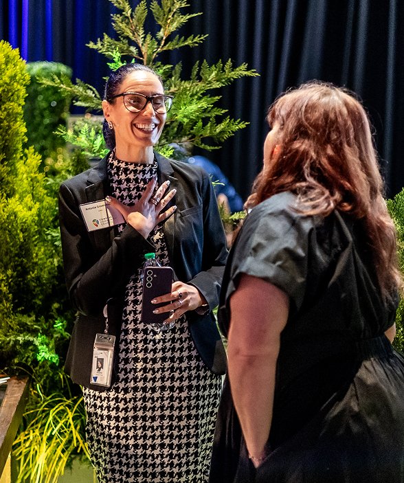 women interacting at conference