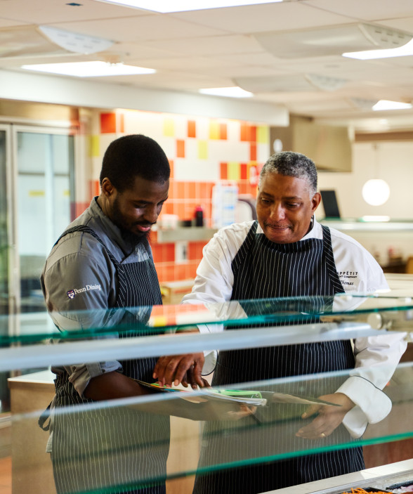 chefs reviewing menu