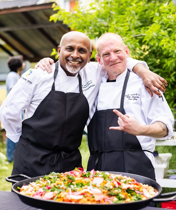 two chefs embracing