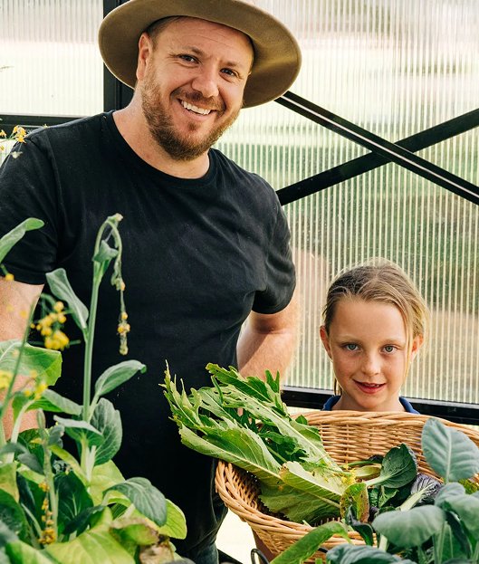 farmer and daughter with produce