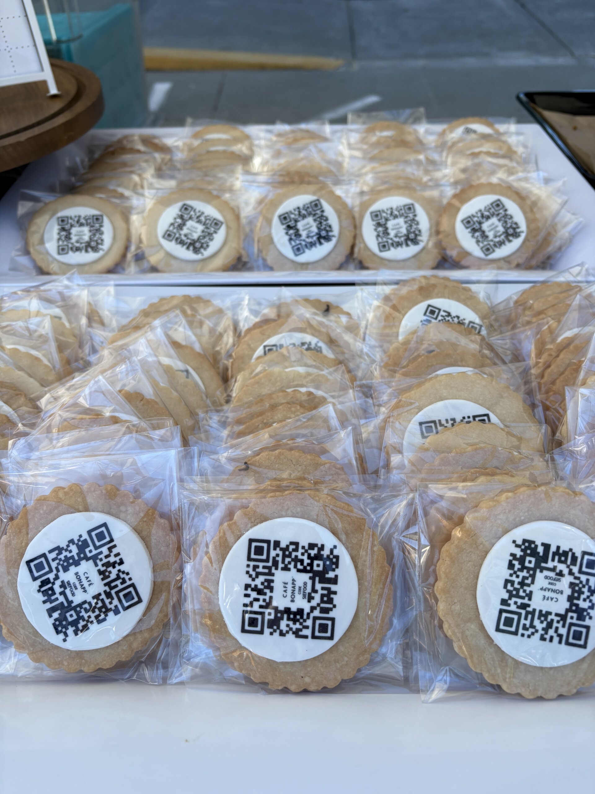 A batch of cookies decorated with QR codes