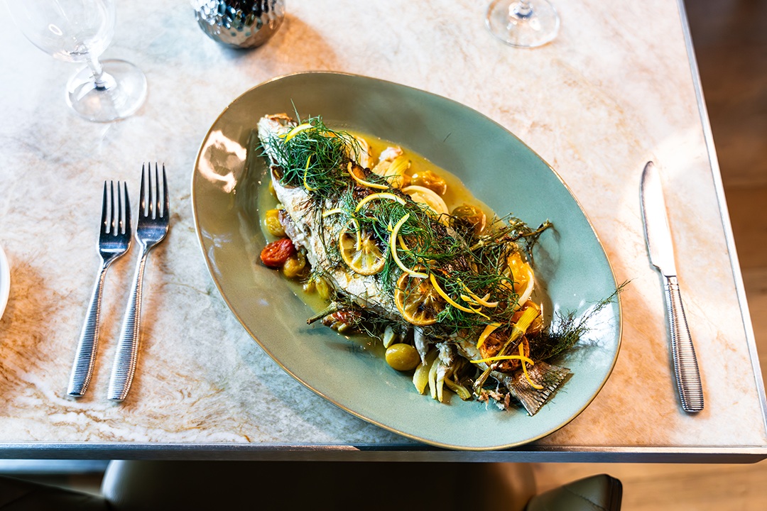 Restaurant glamour shot of whole branzino dish
