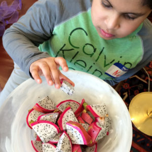 Boy with dragon fruit